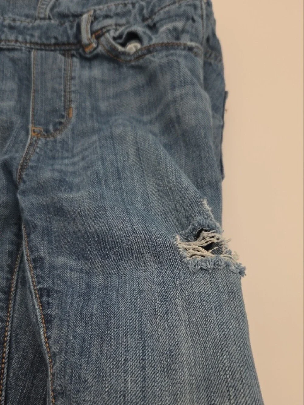 GAP denim garment in classic blue with contrast stitching